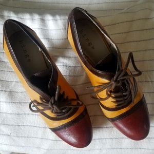 Hinge school teacher booties in shades of brown with burgundy tip